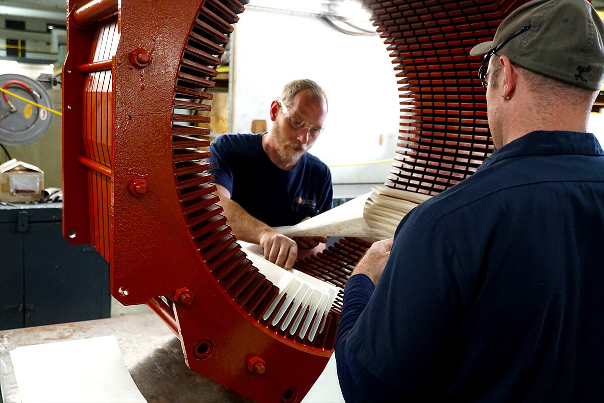 Smith Services staff working on motor repair
